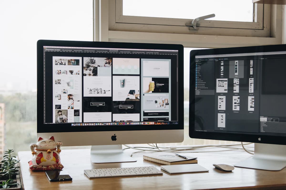 Modern dual-monitor web design workspace